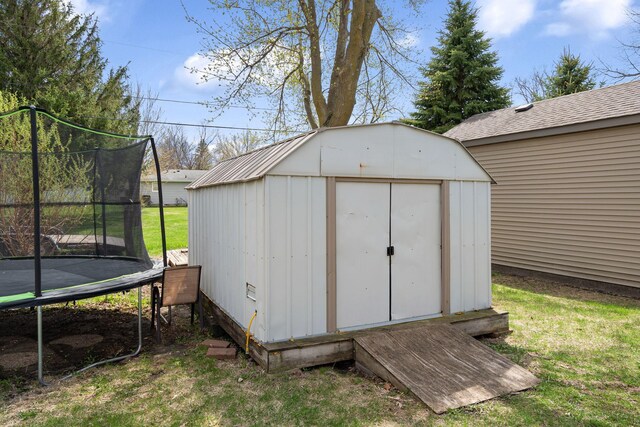404 6th St NW, New Richland, MN 56072 - view of shed with a trampoline