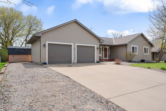 404 6th St NW, New Richland, MN 56072 - single story home featuring an attached garage, driveway, and a shingled roof