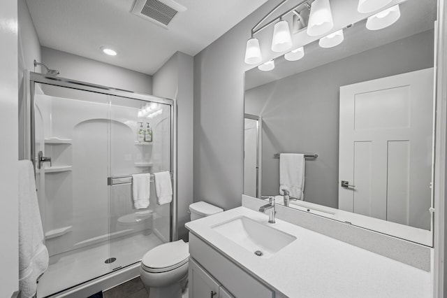 825 Spancil Hill Vw, Woodbury, MN 55129 - full bath featuring toilet, a shower stall, and vanity