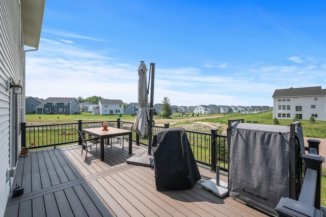 825 Spancil Hill Vw, Woodbury, MN 55129 - wooden terrace featuring a residential view, outdoor dining space, and a yard