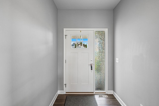 825 Spancil Hill Vw, Woodbury, MN 55129 - entryway with dark wood-style floors and baseboards