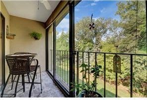 20 Windsor Ln Unit 303A, New Brighton, MN 55112 - balcony featuring a ceiling fan