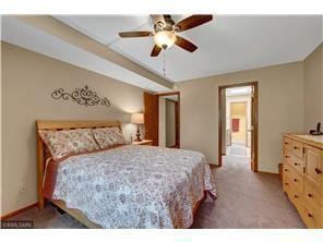20 Windsor Ln Unit 303A, New Brighton, MN 55112 - bedroom with carpet and a ceiling fan
