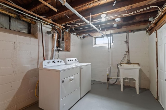 washroom with independent washer and dryer and electric panel