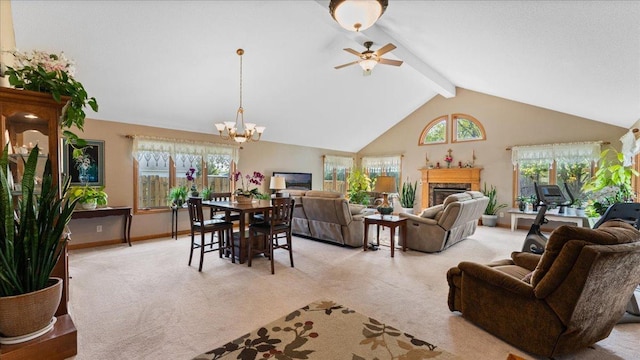 dining room with light colored carpet, a fireplace, beam ceiling, a chandelier, and high vaulted ceiling