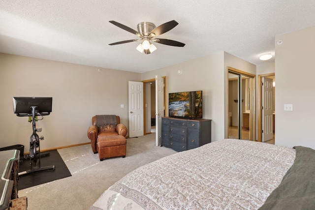 13700 54th Ave N Unit 405, Plymouth, MN 55446 - bedroom with light colored carpet, a closet, a textured ceiling, baseboards, and ceiling fan