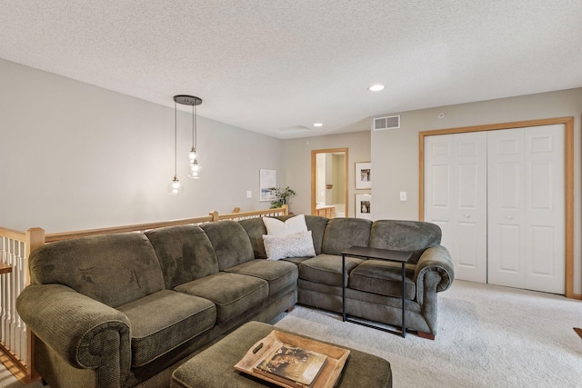 13700 54th Ave N Unit 405, Plymouth, MN 55446 - living room featuring light carpet, recessed lighting, and a textured ceiling