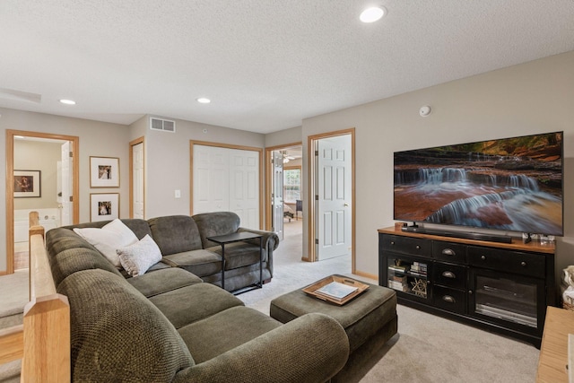 13700 54th Ave N Unit 405, Plymouth, MN 55446 - living room with light carpet, recessed lighting, and a textured ceiling