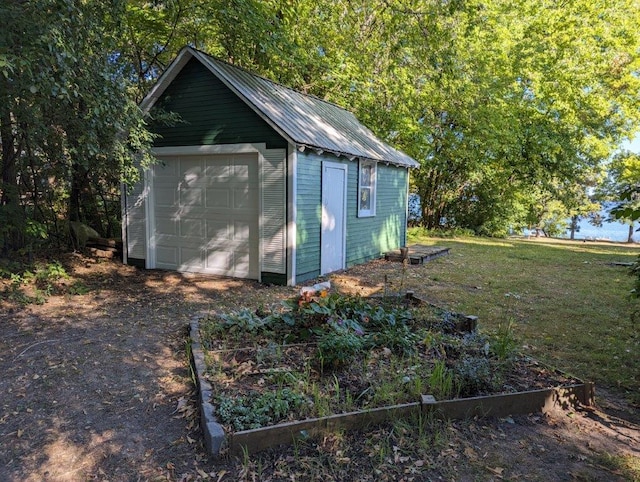 5253 Bald Eagle Blvd, White Bear Twp, MN 55110 - view of outbuilding with a vegetable garden and an outdoor structure