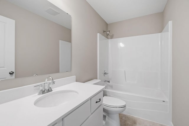 bathroom with toilet, shower / washtub combination, vanity, and tile patterned floors