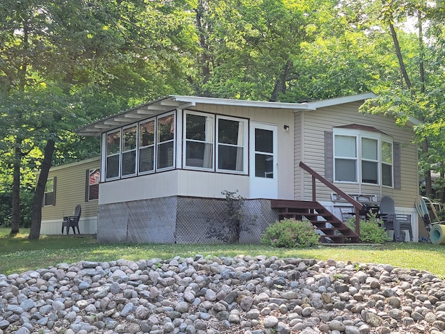 29501 Maplewood Rd Autumn, Unit Autumn, Callaway, MN 56521 - manufactured / mobile home featuring a front yard