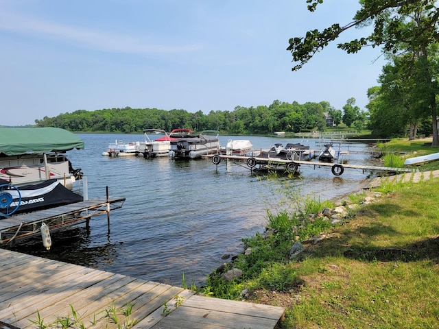 29501 Maplewood Rd Autumn, Unit Autumn, Callaway, MN 56521 - dock featuring a water view and a view of trees