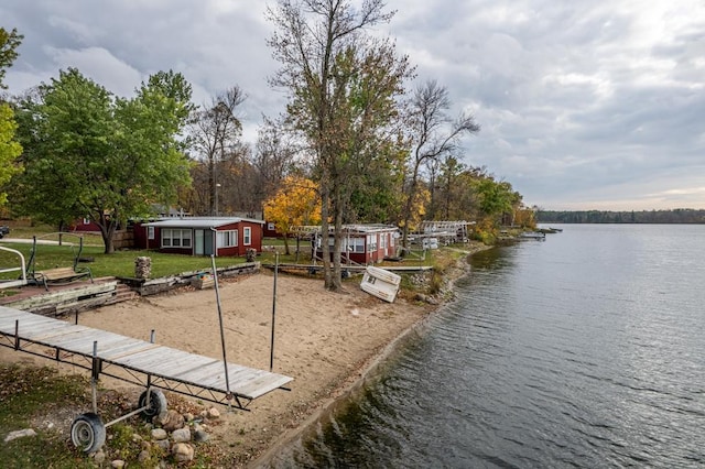 29501 Maplewood Rd Autumn, Unit Autumn, Callaway, MN 56521 - dock area with a water view and a yard