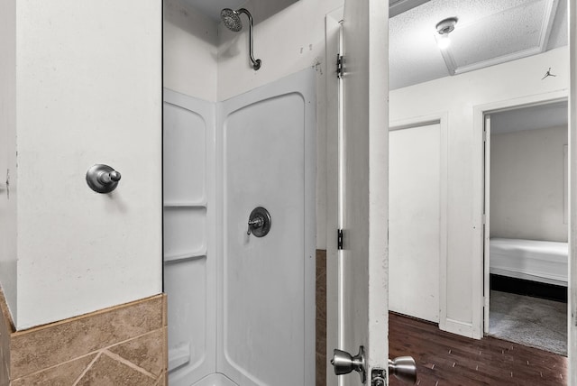 4209 81st Ave N, Brooklyn Park, MN 55443 - full bathroom with a shower and wood finished floors