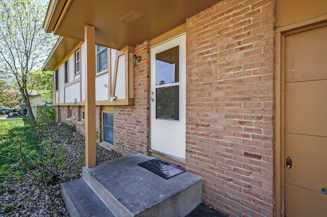 4209 81st Ave N, Brooklyn Park, MN 55443 - property entrance with brick siding