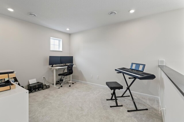 carpeted home office featuring baseboards and recessed lighting