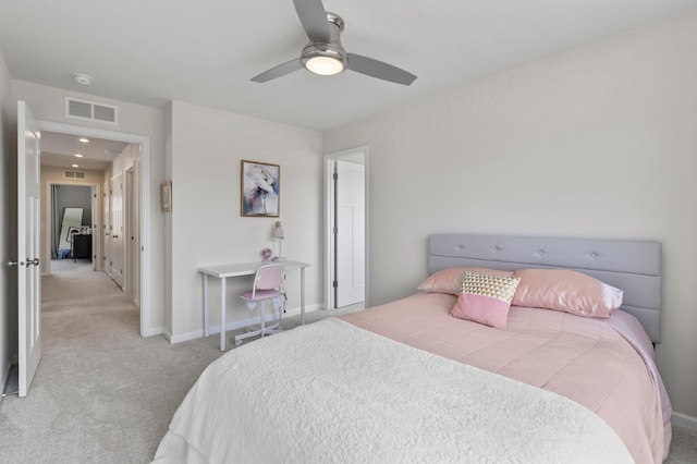 bedroom with carpet flooring, baseboards, and ceiling fan