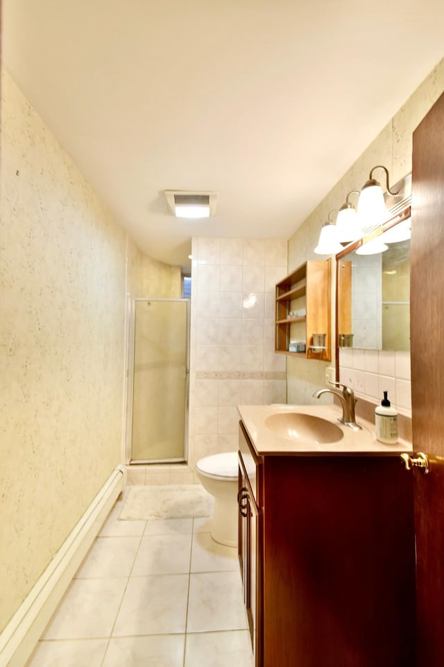 bathroom with toilet, vanity, visible vents, tile patterned flooring, and a shower stall