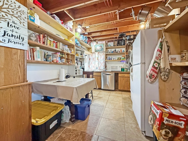 kitchen with open shelves, stainless steel dishwasher, light tile patterned floors, brown cabinetry, and white microwave