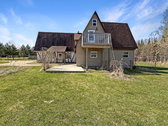 rear view of property featuring a patio