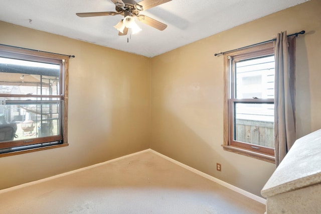 5748 25th Ave S, Minneapolis, MN 55417 - carpeted empty room featuring baseboards and a ceiling fan