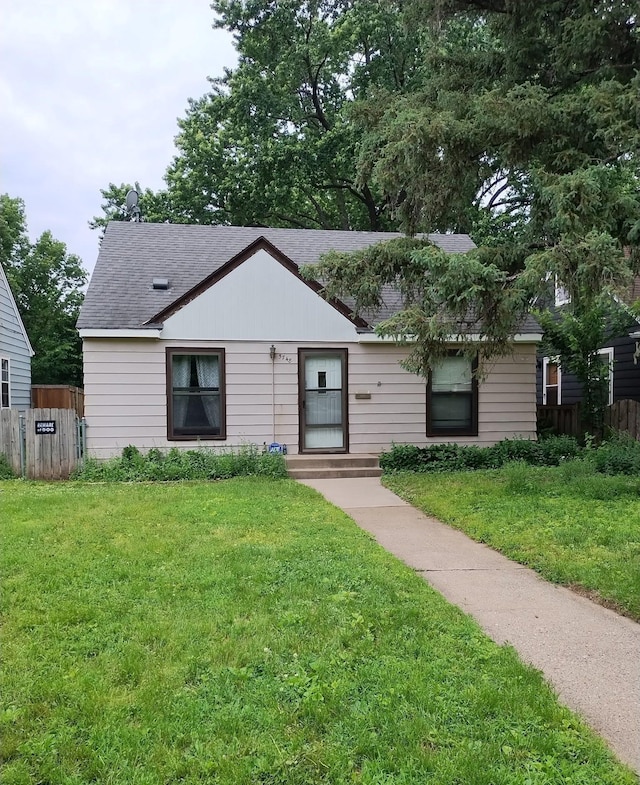 5748 25th Ave S, Minneapolis, MN 55417 - view of front facade featuring roof with shingles