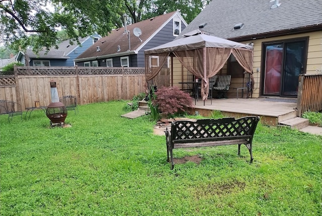 5748 25th Ave S, Minneapolis, MN 55417 - view of yard with a fire pit, a gazebo, and a deck