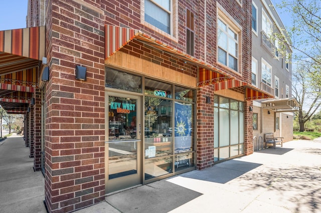 2803 38th St Unit 205, Minneapolis, MN 55406 - doorway to property with brick siding