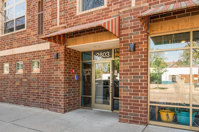 2803 38th St Unit 205, Minneapolis, MN 55406 - property entrance with brick siding