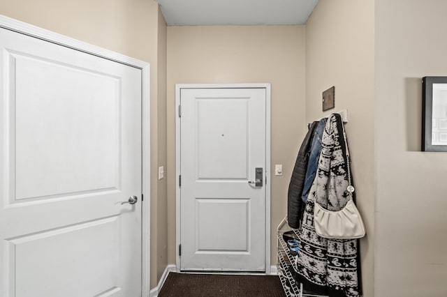 2803 38th St Unit 205, Minneapolis, MN 55406 - doorway to outside featuring baseboards
