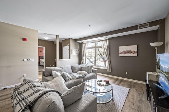 2803 38th St Unit 205, Minneapolis, MN 55406 - living area with wood finished floors and baseboards