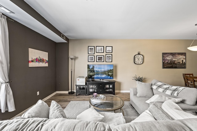 2803 38th St Unit 205, Minneapolis, MN 55406 - living room with wood finished floors and baseboards