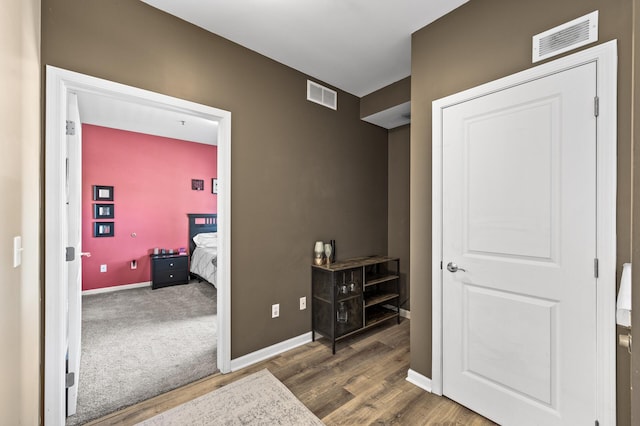2803 38th St Unit 205, Minneapolis, MN 55406 - corridor with wood finished floors and baseboards