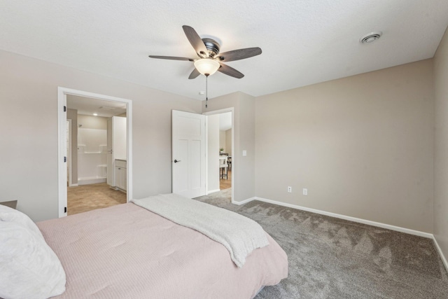 20106 Fitzgerald Trl N, Forest Lake, MN 55025 - bedroom with light carpet, baseboards, connected bathroom, and ceiling fan