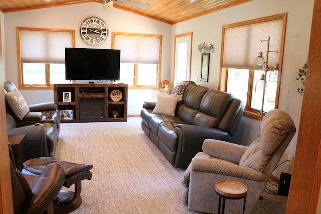 living area with wood ceiling, carpet flooring, lofted ceiling, and baseboards