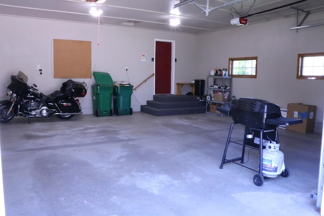 garage featuring a garage door opener