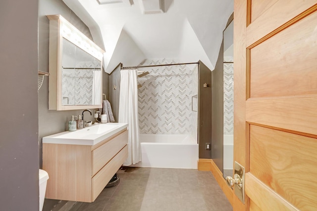bathroom with shower / bath combo with shower curtain, vanity, toilet, tile patterned floors, and lofted ceiling