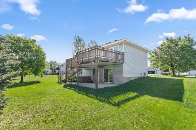 7724 385th St, North Branch, MN 55056 - rear view of property with a patio area, a wooden deck, a yard, and stairs