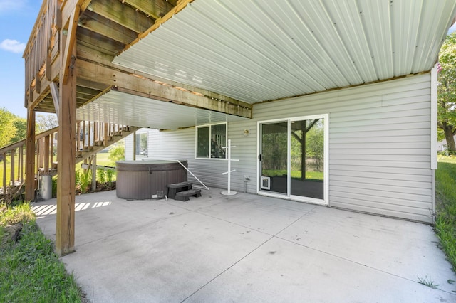 7724 385th St, North Branch, MN 55056 - view of patio featuring a hot tub and stairway
