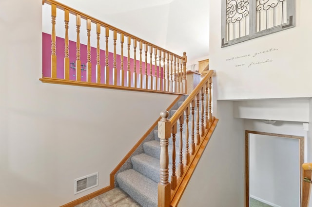 7724 385th St, North Branch, MN 55056 - stairs with carpet flooring and a high ceiling
