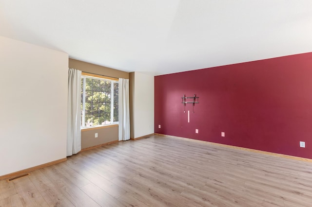7724 385th St, North Branch, MN 55056 - unfurnished room with light wood finished floors and baseboards