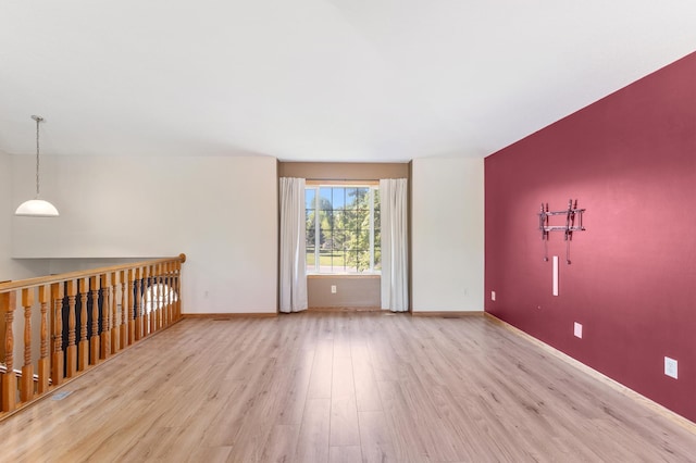 7724 385th St, North Branch, MN 55056 - unfurnished room with wood finished floors and baseboards