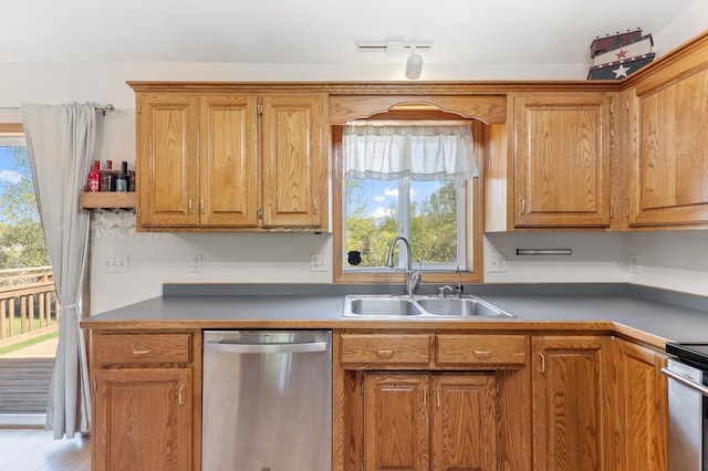 7724 385th St, North Branch, MN 55056 - kitchen with dishwasher, a sink, plenty of natural light, and brown cabinets