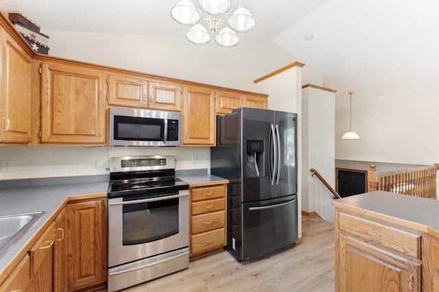 7724 385th St, North Branch, MN 55056 - kitchen with stainless steel appliances, lofted ceiling, a chandelier, light wood-style flooring, and a sink