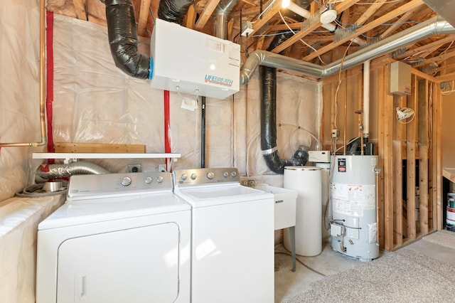 7724 385th St, North Branch, MN 55056 - laundry room featuring gas water heater and washing machine and clothes dryer
