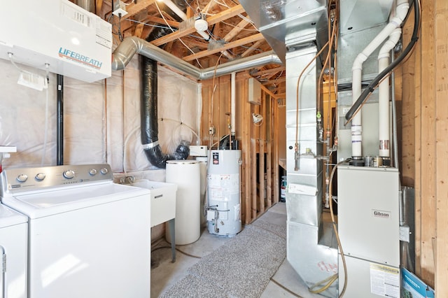 7724 385th St, North Branch, MN 55056 - unfinished below grade area featuring water heater, washing machine and clothes dryer, and a sink