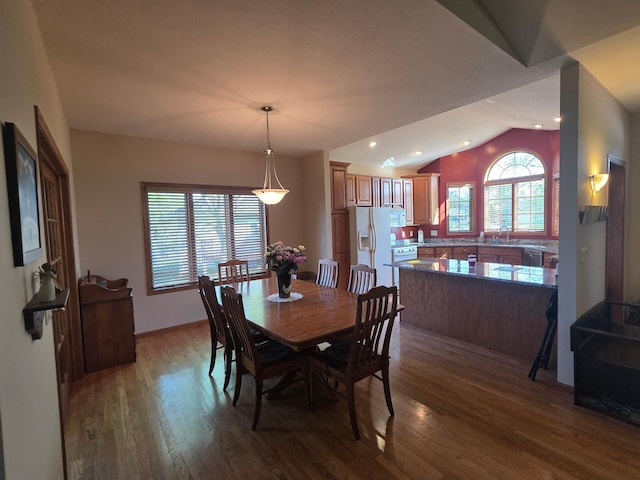 1073 Harvest Way, Lake City, MN 55041 - dining room featuring wood finished floors, vaulted ceiling, and recessed lighting