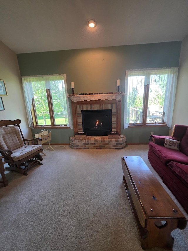1073 Harvest Way, Lake City, MN 55041 - carpeted living room with healthy amount of natural light and a brick fireplace