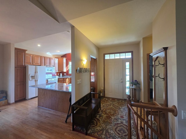 1073 Harvest Way, Lake City, MN 55041 - foyer entrance with plenty of natural light, wood finished floors, and lofted ceiling