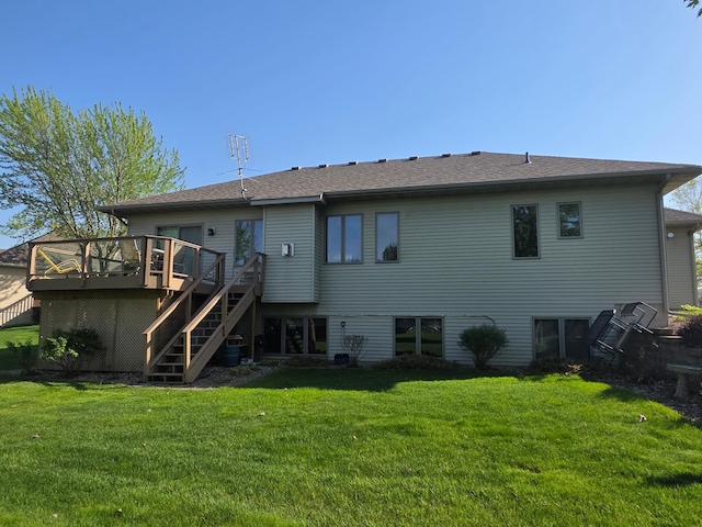 1073 Harvest Way, Lake City, MN 55041 - back of house with a yard, stairs, and a wooden deck